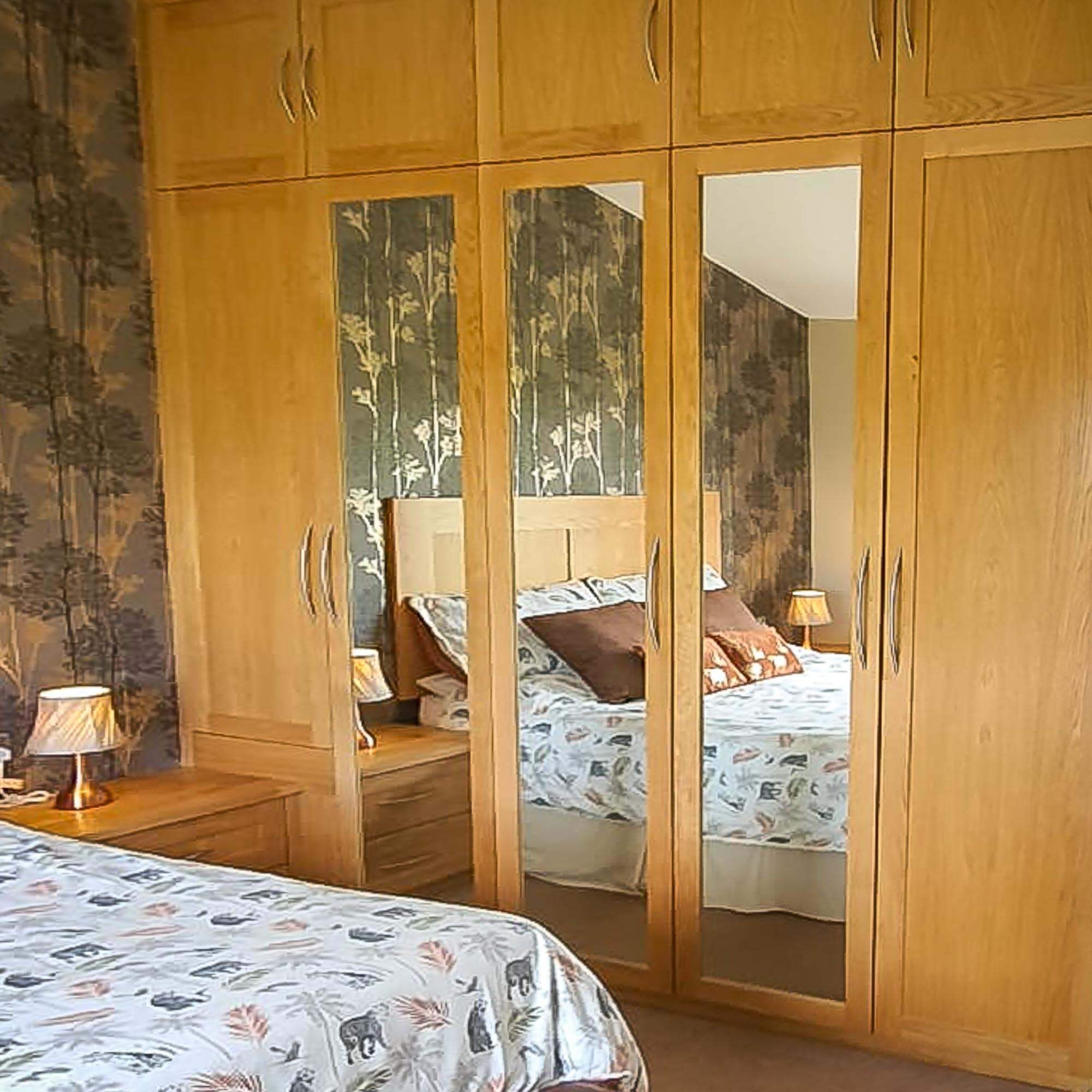 Oak floor to ceiling wardrobes Oak floor to ceiling wardrobes